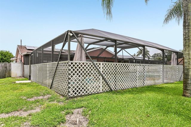 2457 SW Mercer Street, Port St. Lucie, FL 34984