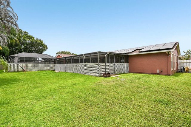 2457 SW Mercer Street, Port St. Lucie, FL 34984