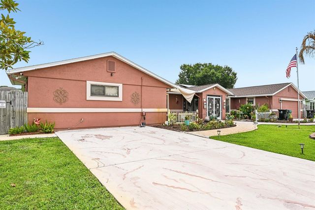 2457 SW Mercer Street, Port St. Lucie, FL 34984