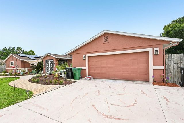 2457 SW Mercer Street, Port St. Lucie, FL 34984