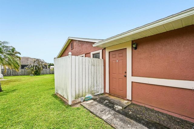 2457 SW Mercer Street, Port St. Lucie, FL 34984