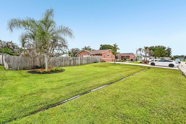 2457 SW Mercer Street, Port St. Lucie, FL 34984