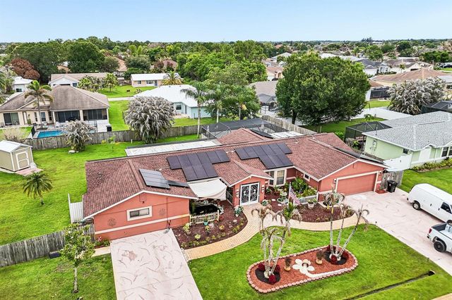 2457 SW Mercer Street, Port St. Lucie, FL 34984