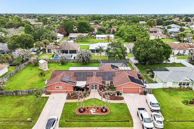 2457 SW Mercer Street, Port St. Lucie, FL 34984