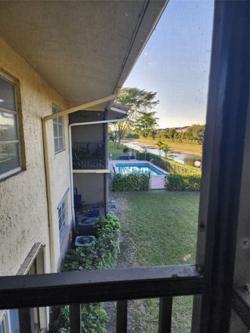8705 NW 38th Drive 7b, Coral Springs, FL 33065