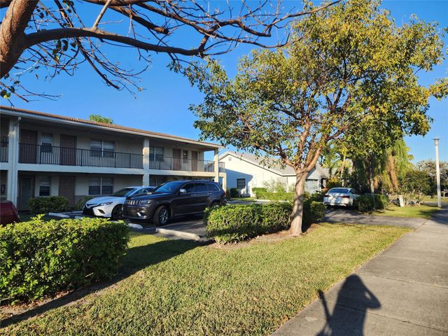 8705 NW 38th Drive 7b, Coral Springs, FL 33065