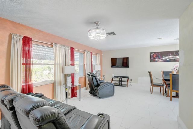 1678 COUNTRY CLUB PARKWAY, Lehigh Acres, FL 33936