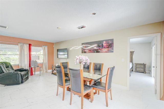 1678 COUNTRY CLUB PARKWAY, Lehigh Acres, FL 33936