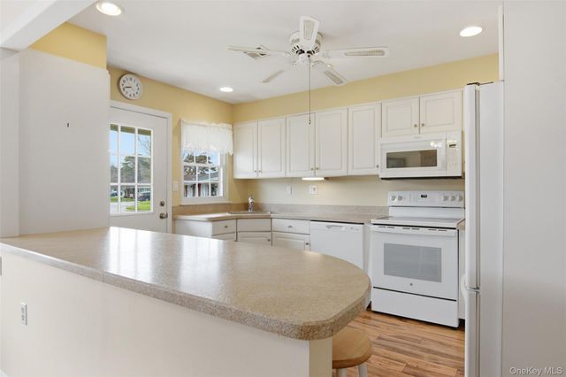 150 Eastbourne Court B, Ridge, NY 11961