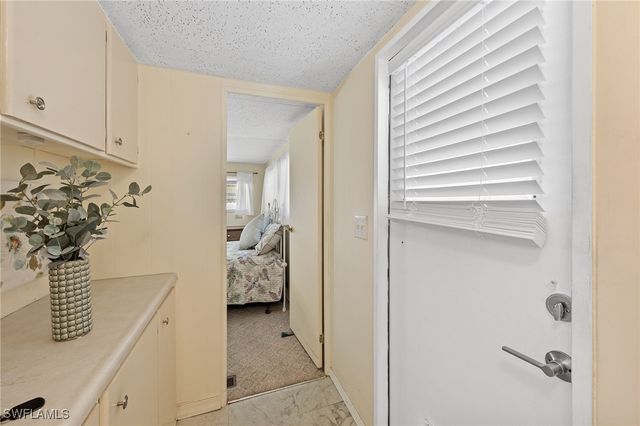 16 San Remo CIR, Naples, FL 34112