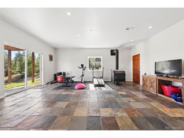 30889 Manitoba Dr, Evergreen, CO 80439