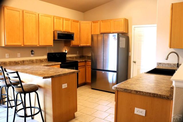 226 E Falcon Dr, Pueblo West, CO 81007