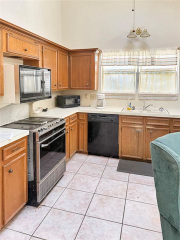 58 April Wind Drive S, Conroe, TX 77356