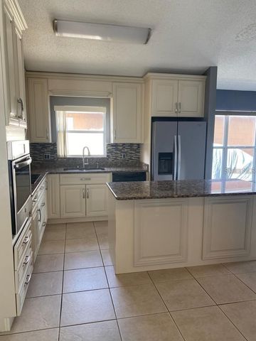 9655 HOLLYHILL DRIVE, Orlando, FL 32824