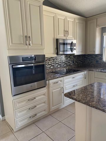 9655 HOLLYHILL DRIVE, Orlando, FL 32824