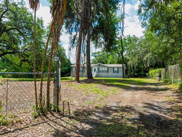 1819 SINCLAIR HILLS ROAD, Lutz, FL 33549