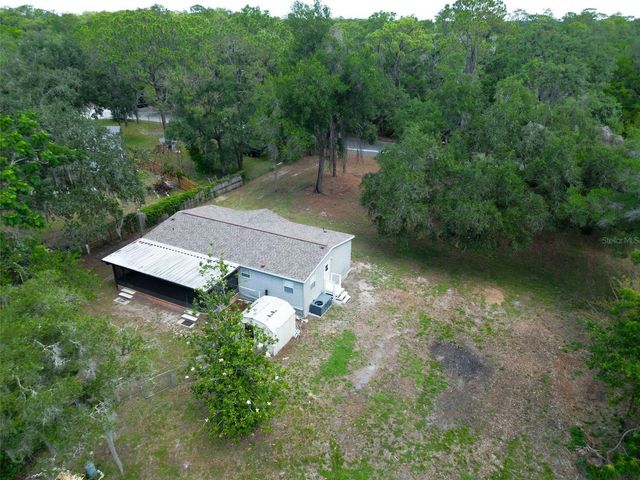 1819 SINCLAIR HILLS ROAD, Lutz, FL 33549