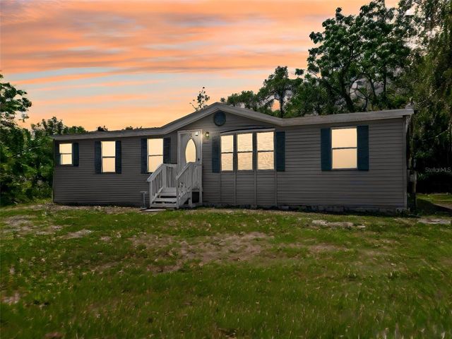 1819 SINCLAIR HILLS ROAD, Lutz, FL 33549