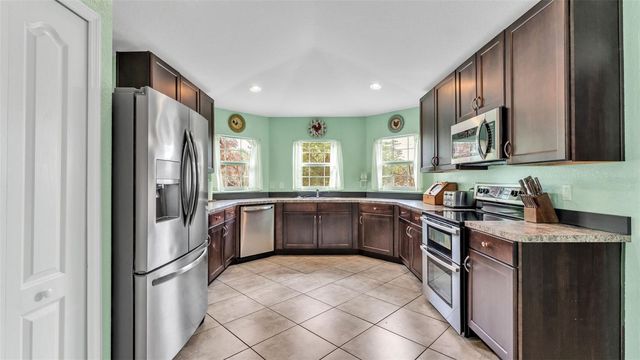 1456 WALLACE MANOR LOOP, Winter Haven, FL 33880