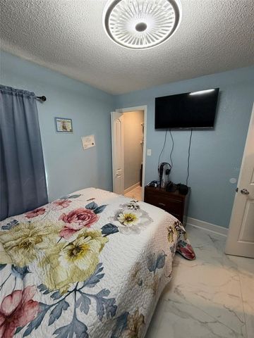 911 MAYDELL DRIVE, Tampa, FL 33619