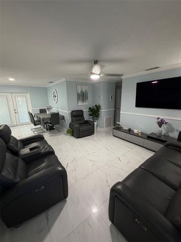 911 MAYDELL DRIVE, Tampa, FL 33619