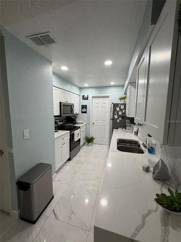 911 MAYDELL DRIVE, Tampa, FL 33619