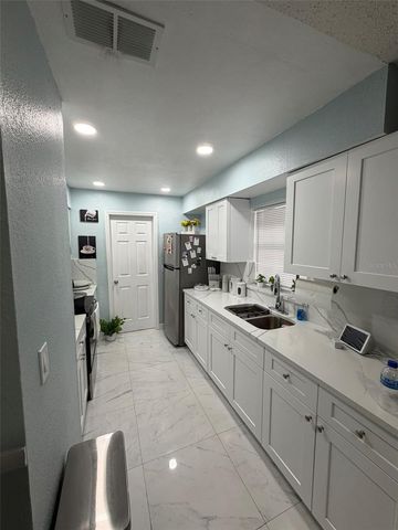 911 MAYDELL DRIVE, Tampa, FL 33619