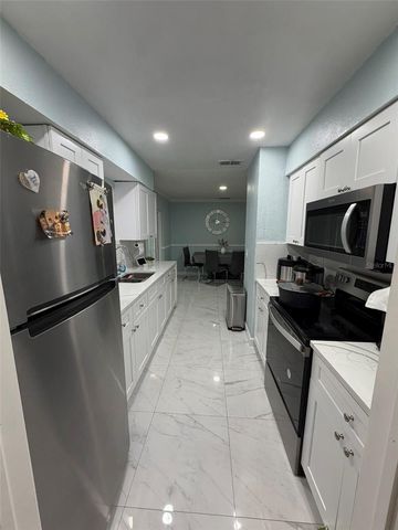 911 MAYDELL DRIVE, Tampa, FL 33619