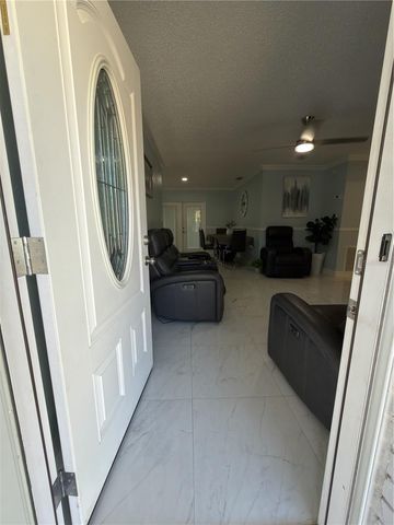 911 MAYDELL DRIVE, Tampa, FL 33619