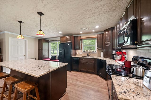 115 County Road 3189c, Cleveland, TX 77327
