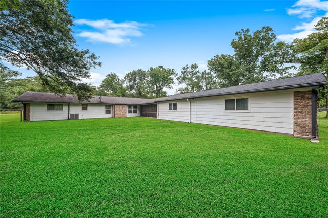 115 County Road 3189c, Cleveland, TX 77327