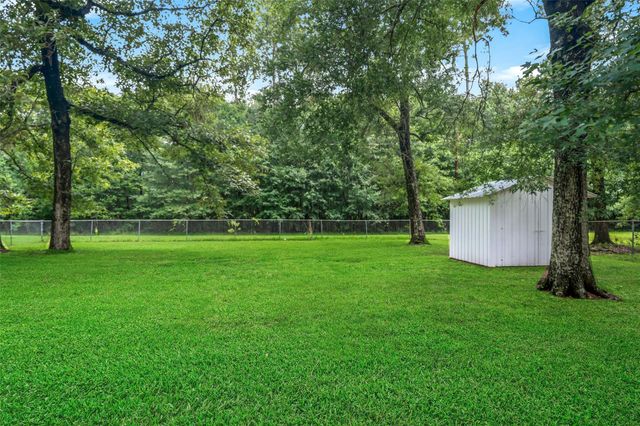 115 County Road 3189c, Cleveland, TX 77327