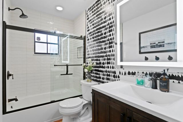 7915 FLOWERFIELD DRIVE, Tampa, FL 33615