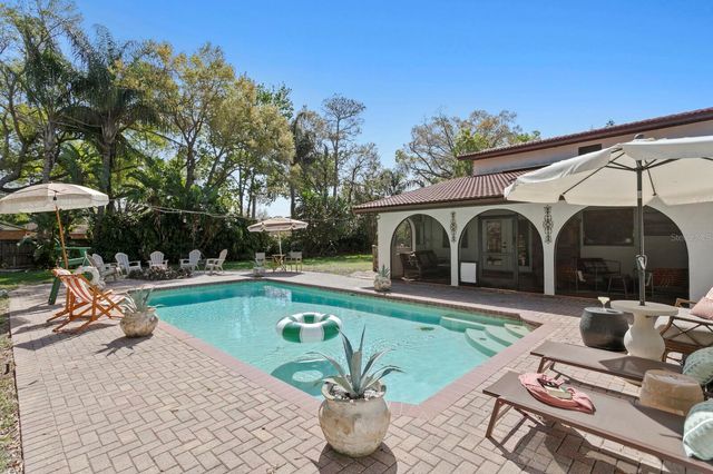 7915 FLOWERFIELD DRIVE, Tampa, FL 33615