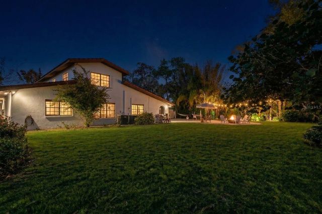 7915 FLOWERFIELD DRIVE, Tampa, FL 33615