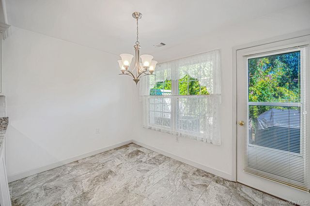 20 Wainscott Court, Ridge, NY 11961