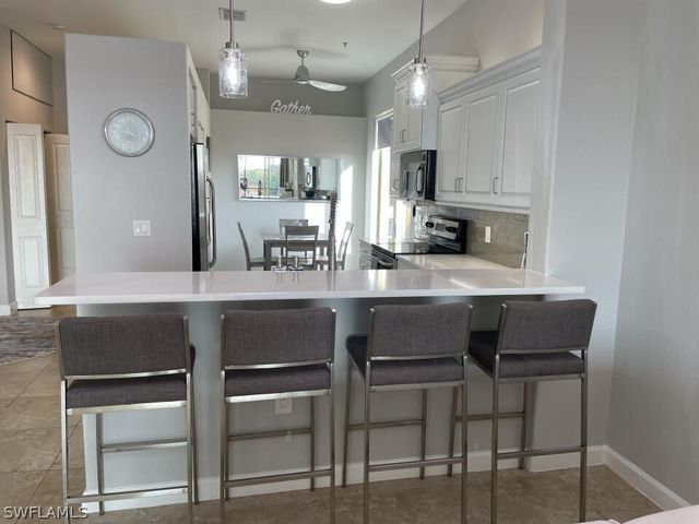 8597 Via Garibaldi CIR 301, Estero, FL 33928