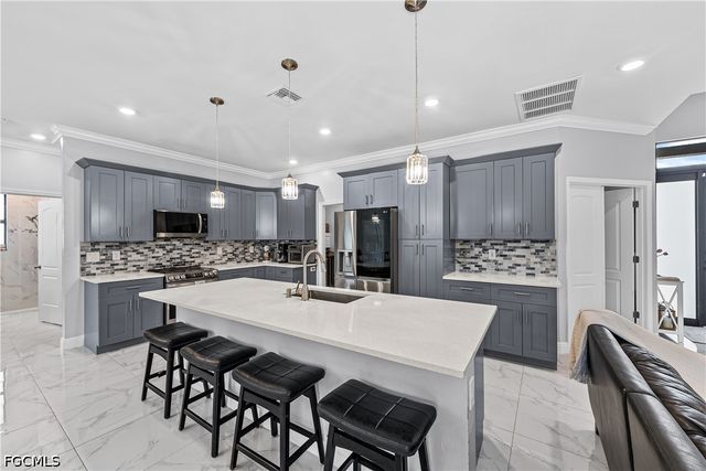 1405 Bruce AVE S, Lehigh Acres, FL 33976
