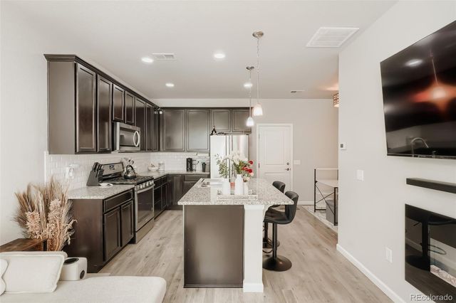 15476 W 64th Loop B, Arvada, CO 80007