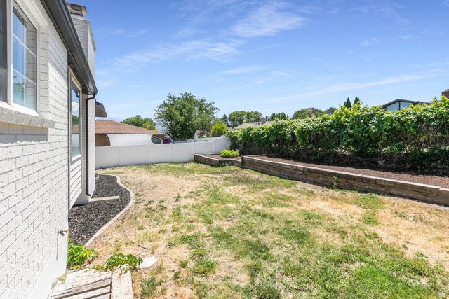 3063 W HOLDERSHILL LN, Taylorsville, UT 84129