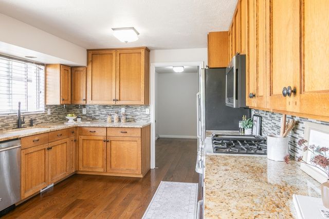 3063 W HOLDERSHILL LN, Taylorsville, UT 84129