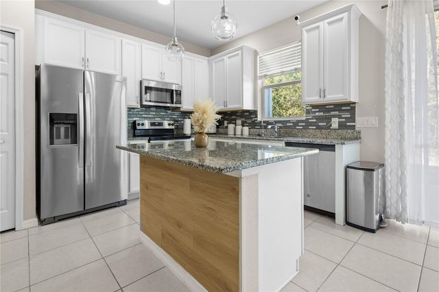 6989 TUSSILAGO WAY, Orlando, FL 32822