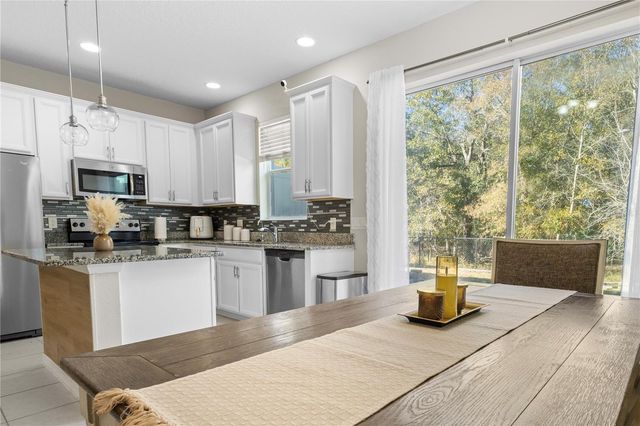 6989 TUSSILAGO WAY, Orlando, FL 32822