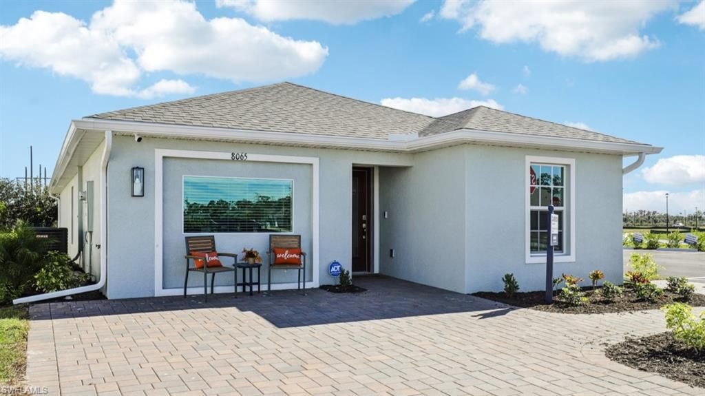 11305 SUNSET PRESERVE DR, LEHIGH ACRES, FL 33971 — exterior
