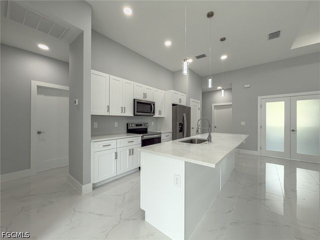 438 Raymer ST, Lehigh Acres, FL 33974