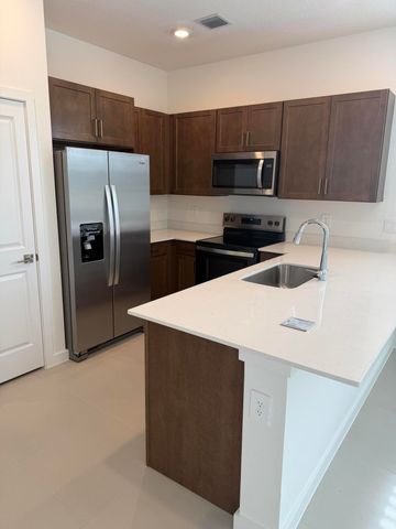 147 LAKESIDE LANDING Court, Royal Palm Beach, FL 33411
