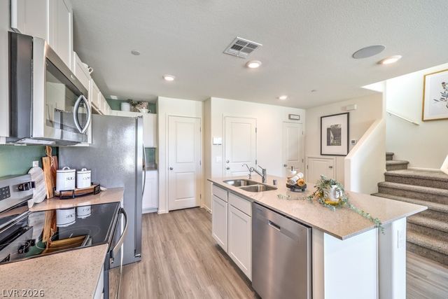 6075 Ginger Garden Street 13, North Las Vegas, NV 89081