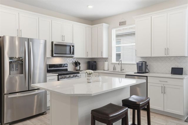 13640 SPLASHING ISLA DRIVE, Winter Garden, FL 34787