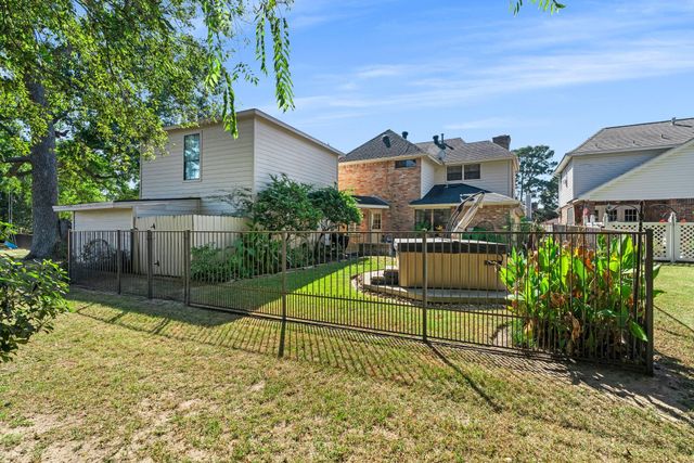 6971 Breezy Point, Willis, TX 77318