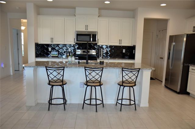 6877 WILSON HAMMOCK AVENUE, Groveland, FL 34736